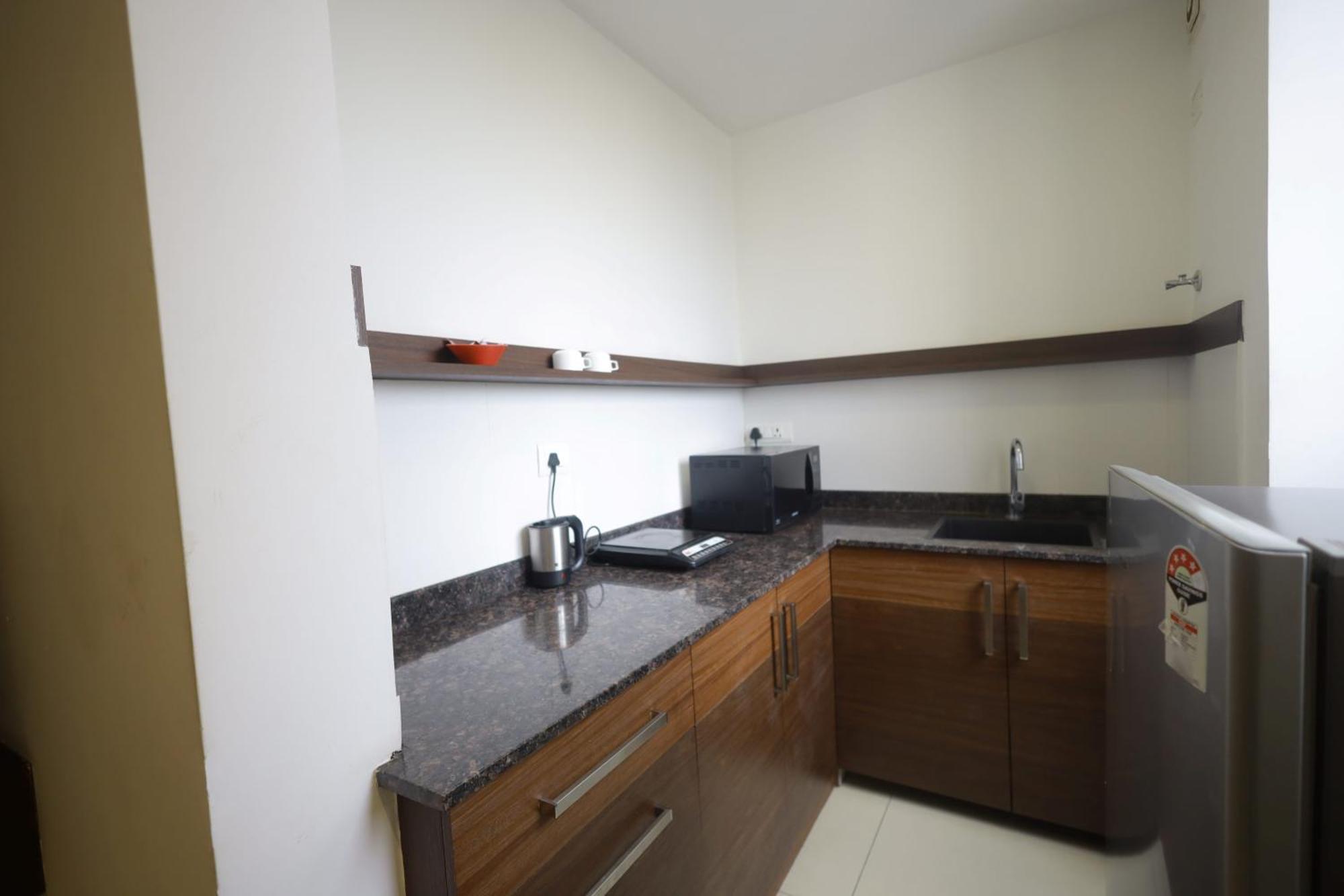 העיר בנגלור Ixora Suites מראה חיצוני תמונה