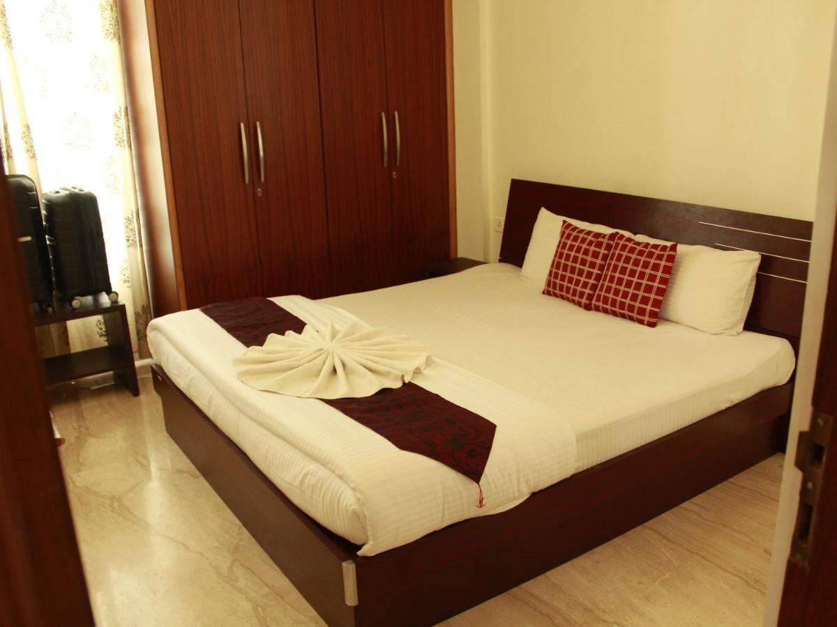 העיר בנגלור Ixora Suites מראה חיצוני תמונה